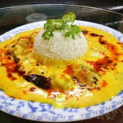 Pakodi ki kadhi with plain rice A picture of Pakodi ki kadhi with plain rice.