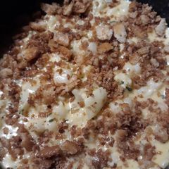 A picture of Hominy and Cauliflower in a Cheesey Sauce.