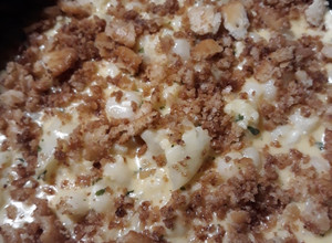 A picture of Hominy and Cauliflower in a Cheesey Sauce.