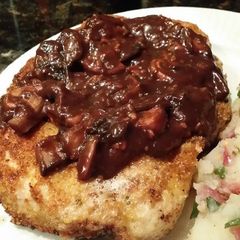A picture of Brad's schnitzel with red wine and mushroom gravy.