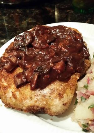 A picture of Brad's schnitzel with red wine and mushroom gravy.
