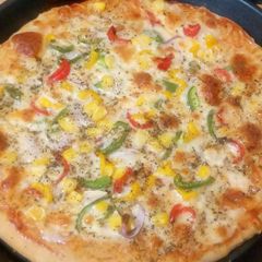 A picture of Super healthy Whole wheat and oats base pizza.