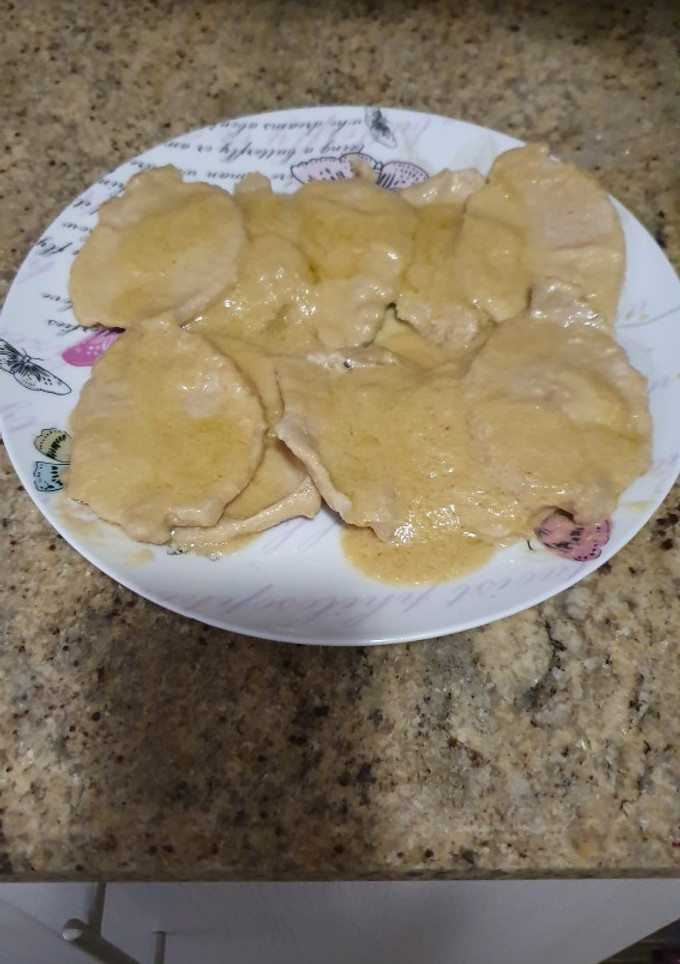 Una foto de Cinta de lomo en salsa