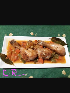 Una foto de Muslos de pollo guisados