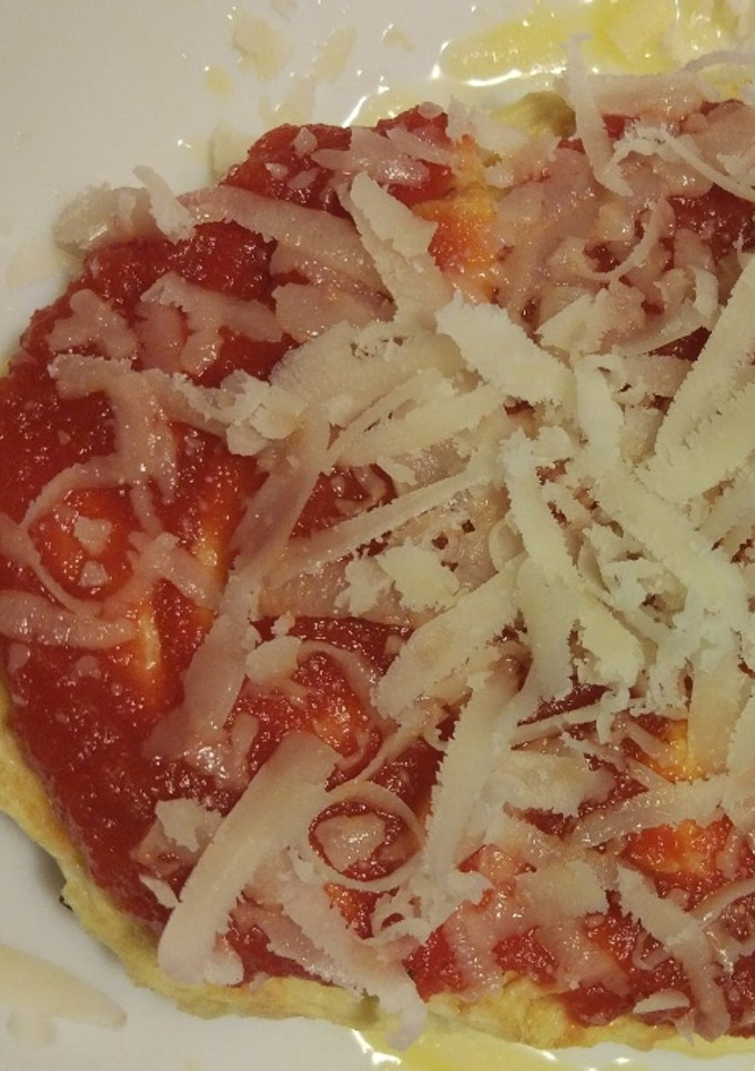 Una foto de Tortilla de espinacas con tomate y queso, gratinada