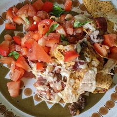 A picture of Summer party Chicken and bacon nachos.