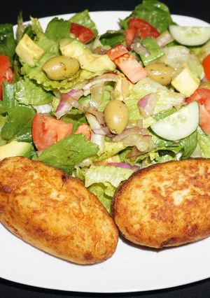 Una foto de Papas Rellenas con Pino de Vacuno