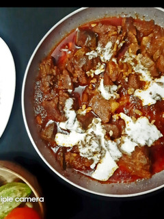 A picture of Walnut mutton curry.