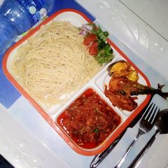 A picture of Pasta with sauce.