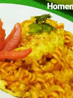 A picture of Fusilli Omellete with Tomato Sauce.
