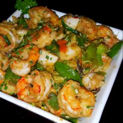 A picture of Mike's Spicy Garlic Shrimp & Scallop Asian Stir Fry Over.Rice.
