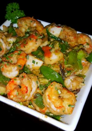 A picture of Mike's Spicy Garlic Shrimp & Scallop Asian Stir Fry Over.Rice.