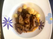 Una foto de bondiola de cerdo salsa barbacoa