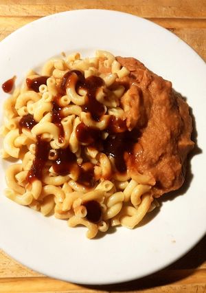 A picture of Mashed Sweet n sour beans. Served with elbow macoroni.