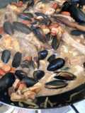 Discada de carnes con mejillones