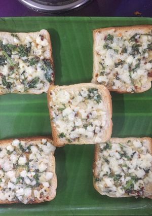 A picture of Cheese and garlic bread.