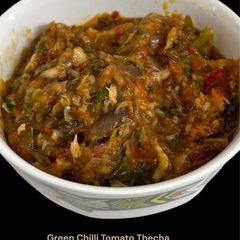 Green Chilli Tomato Thecha | Fiery Maharashtrian-Style Relish A picture of Green Chilli Tomato Thecha | Fiery Maharashtrian-Style Relish.
