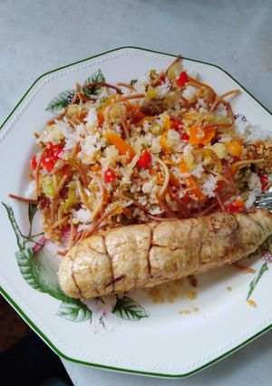 Una foto de Arroz de verduras con fideos y hueva de merluza