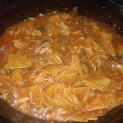 A picture of Easy Crockpot Chicken Enchilada Casserole.