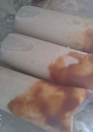Una foto de Bolis o marcianito gourmet de banana con dulce de leche