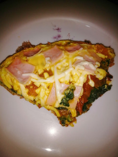 Una foto de Tortilla de acelga tipo pizza