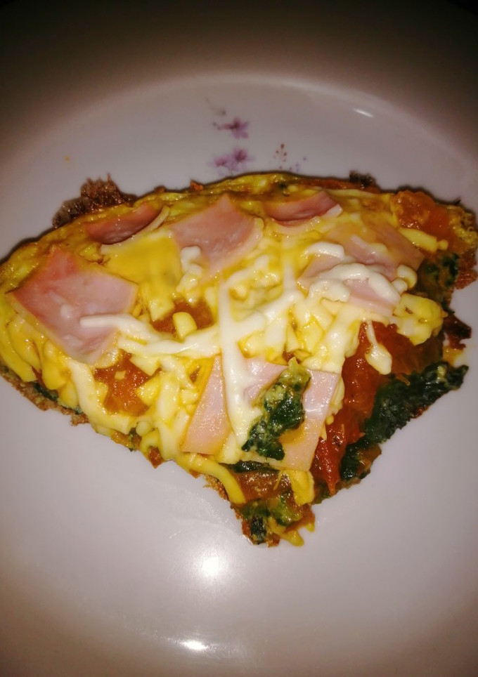Una foto de Tortilla de acelga tipo pizza
