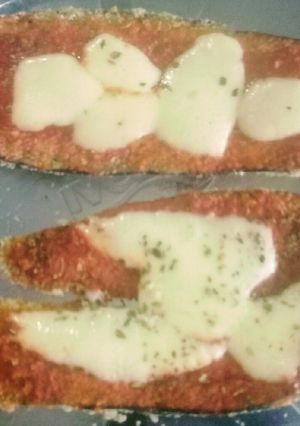 Una foto de MILANESAS DE BERENJENA🍆a la napolitana 😋👌
