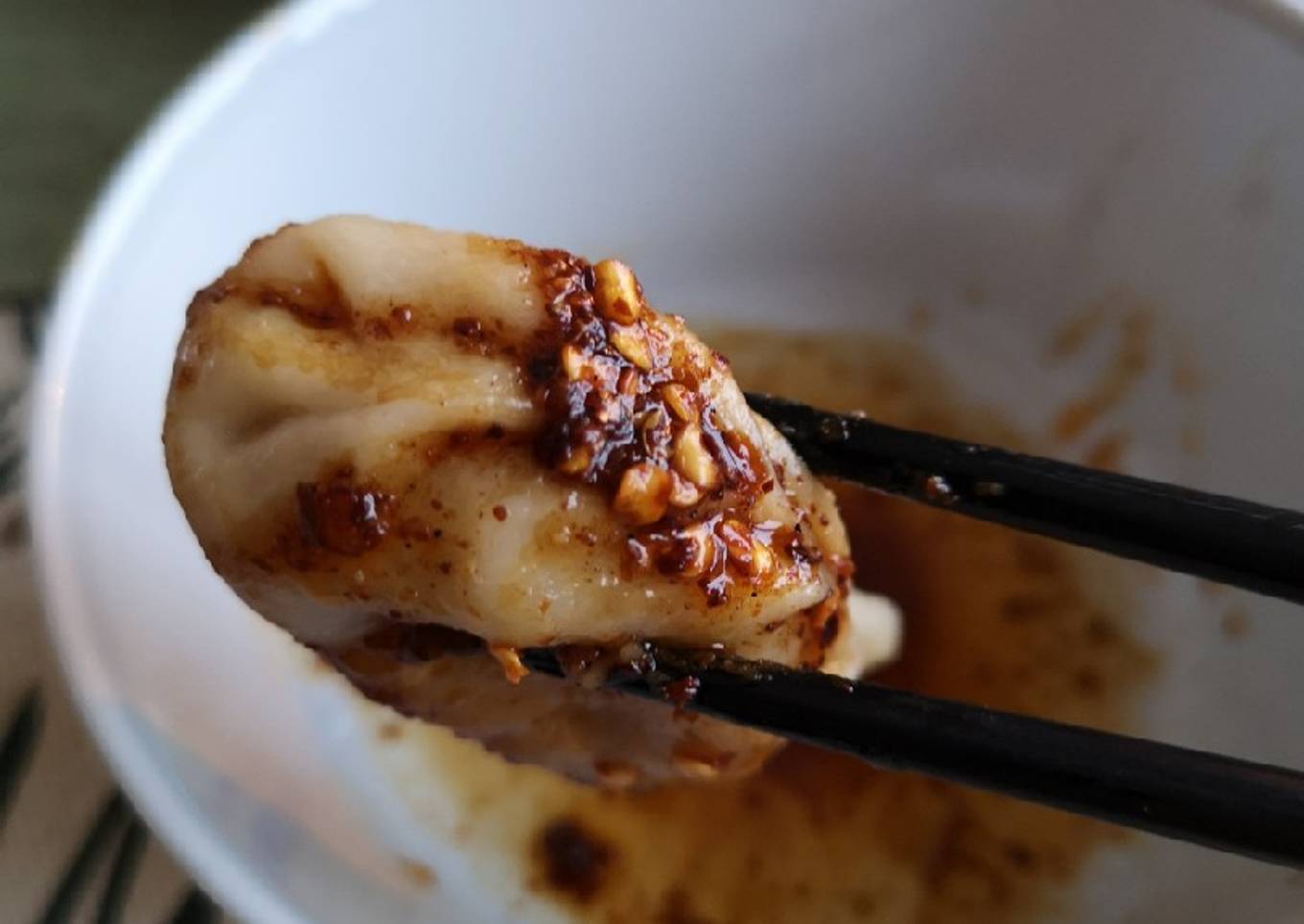 White bean dumplings dip in sichuan dipsauce