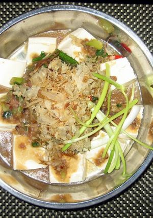 A picture of Tofu Top Ground Pork And Shaved Mackeral.
