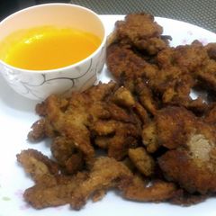 A picture of Fried Oyster Mushroom With Orange Sauce.