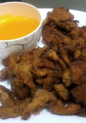 A picture of Fried Oyster Mushroom With Orange Sauce.