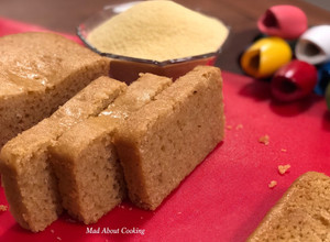 A picture of Sooji Atta Cake (Whole Wheat Rava Cake) Pressure Cooker Recipe Vanilla Rava Cake.