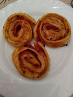 Una foto de Rollitos de jamón y queso
