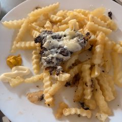 A picture of Cheesy Smash Patty Fries.