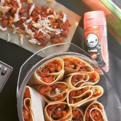 A picture of Chicken lasagna rolls.