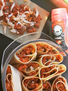 A picture of Chicken lasagna rolls.