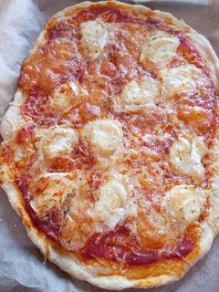 Une photo de La pâte à pizza