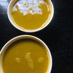 A picture of Horsegram spinach soup.