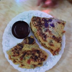 A picture of Mix Veg Uttapam.