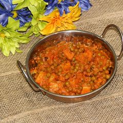 A picture of Dhaba Style Aloo Matar / Indian Roadside Restaurant Style Potatoes & Green Peas Curry.