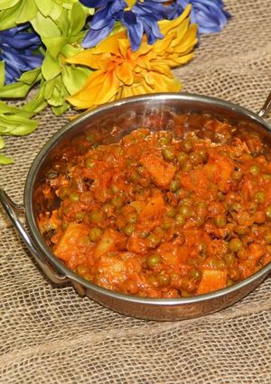 A picture of Dhaba Style Aloo Matar / Indian Roadside Restaurant Style Potatoes & Green Peas Curry.