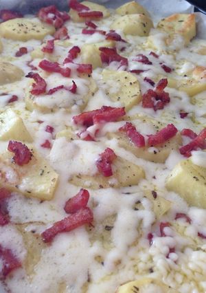 Una foto de Patatas gratinadas con queso y bacon