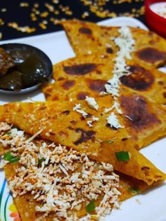 A picture of Toor dal paratha with paneer masala stuffing.