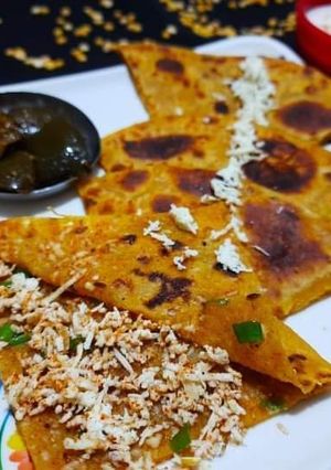 A picture of Toor dal paratha with paneer masala stuffing.