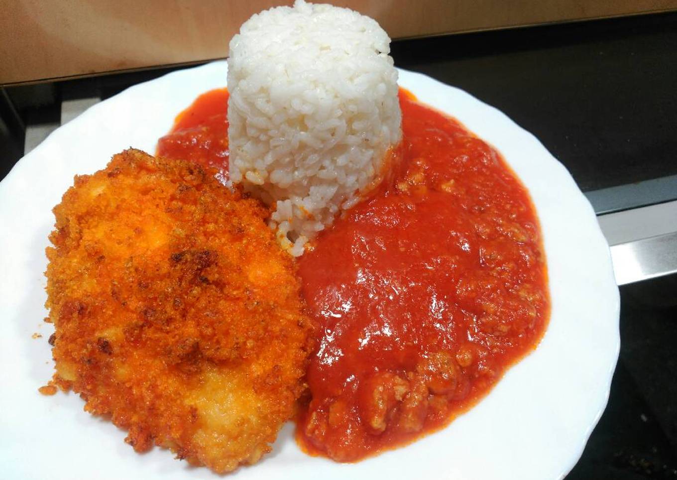 Pechuga rebozada con arroz