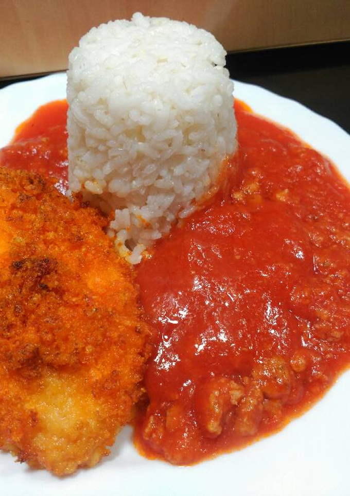 Una foto de Pechuga rebozada con arroz