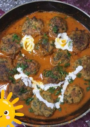 A picture of PALAK TIKKI with gravy.