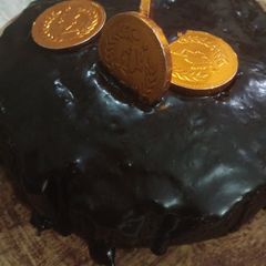 A picture of Chocolate cake with homemade butter.