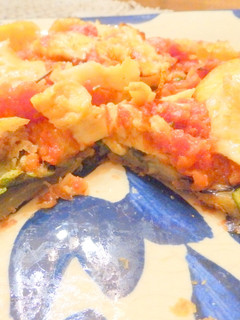 Una foto de Tatín de tomate mozzarella y calabacín