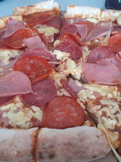Una foto de Pizza doble queso